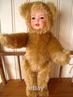 teddy bear with porcelain face