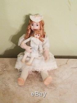 112 Scale Vintage Handmade Child Porcelain Doll holding tiny doll- Jill Nix