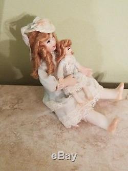112 Scale Vintage Handmade Child Porcelain Doll holding tiny doll- Jill Nix