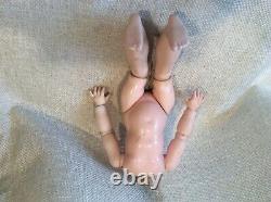 12 Antique toddler doll body (needs T. L. C)