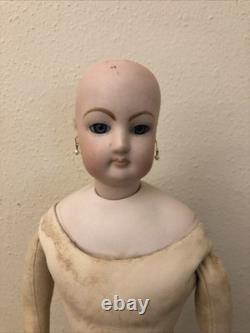 17 Francois Gaultier (F. G.) Bisque Doll With Leather Body (tear in left elbow)