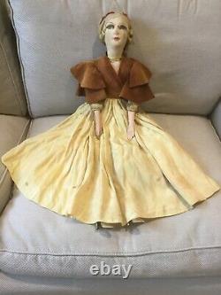 1920s antique Boudoir doll with porcelain limbs, silk dress, wood wool stuffed