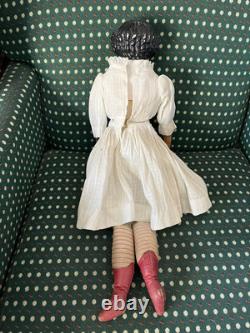 19th Century 21 China Head Doll withLeather Arms & Boots, Flat Top Black Hair