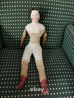 19th Century 21 China Head Doll withLeather Arms & Boots, Flat Top Black Hair