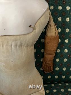 19th Century 21 China Head Doll withLeather Arms & Boots, Flat Top Black Hair