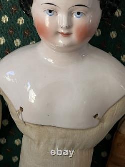 19th Century 21 China Head Doll withLeather Arms & Boots, Flat Top Black Hair