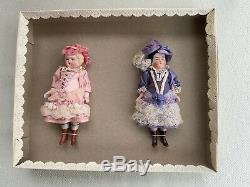 2 antique porcelain dolls in the O. K