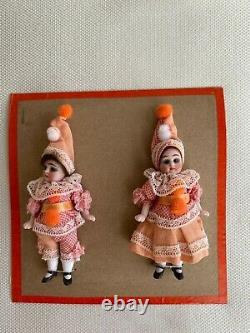 2 antique porcelain dolls on a sales card-Hertwig & Co