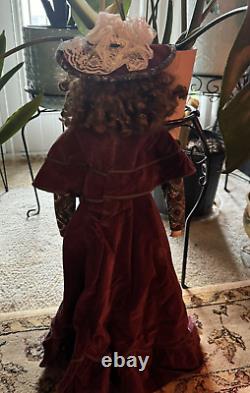 27 Vintage Porcelain Brunette Doll in Red Velvet Dress And Hat