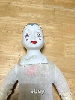 4 Vintage Porcelain Clown Dolls