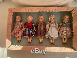 5 antique porcelain head dolls in a box brothers Heubach