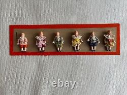 6 clothed antique porcelain dolls on sample card Hertwig & Co