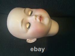 7 antique bisque doll head. Kestner #214