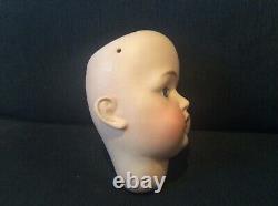 7 antique bisque doll head. Kestner #214