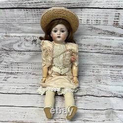 ANTIQUE or REPRODUCTION PORCELAIN Doll withclothing Used