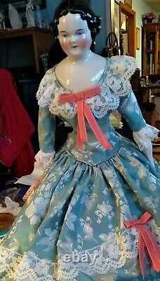 Antique 23 Inch German China Head Doll Ceramic Top Cloth Body 1850s Collectible
