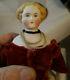 Antique 9 Porcelain Doll & Clothing & Dome Stand