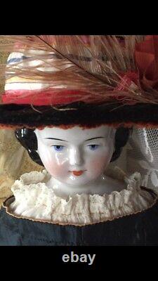 Antique China Doll Early 23 C. 1850-1880s China arms and feet/boots