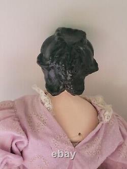 Antique China Head Porcelain Chestplate to Head Legs & Hands Hair Pulled to Bun
