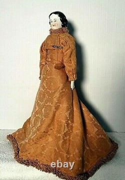 Antique Early China Head Flat Top Flowing Brown Dress