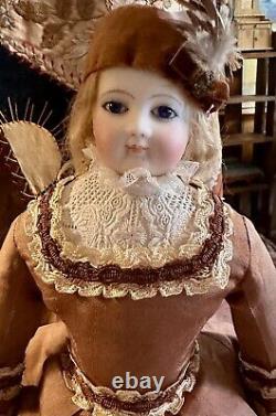 Antique French 17 Poupee Peau Jumeau WithKid Over Wood Body, Bisque Arms Fashion