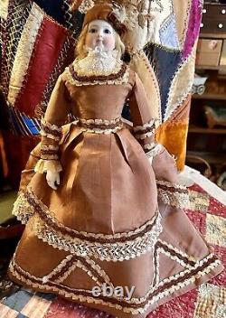 Antique French 17 Poupee Peau Jumeau WithKid Over Wood Body, Bisque Arms Fashion