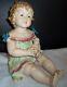 Antique German Bisque Porcelain Piano Baby Girl & Holding A Doll Huge