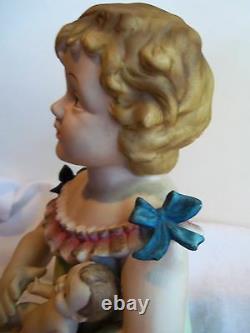 Antique German Bisque Porcelain Piano Baby Girl & Holding a Doll huge