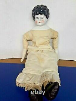 Antique German China Head Doll with porcelain arms, dress, boots