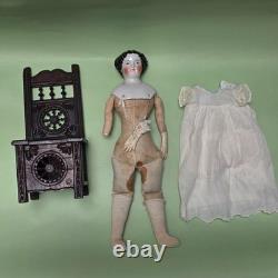 Antique German China head doll 15 inches tall and also included doll chair
