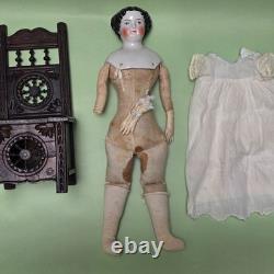 Antique German China head doll 15 inches tall and also included doll chair
