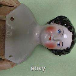 Antique German China head doll 15 inches tall and also included doll chair