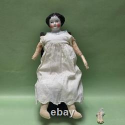 Antique German China head doll 15 inches tall and also included doll chair