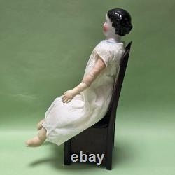 Antique German China head doll 15 inches tall and also included doll chair