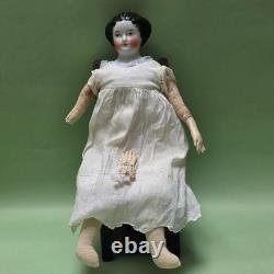 Antique German China head doll 15 inches tall and also included doll chair