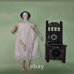Antique German China head doll 15 inches tall and also included doll chair
