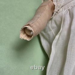 Antique German China head doll 15 inches tall and also included doll chair