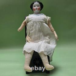 Antique German China head doll 15 inches tall and also included doll chair