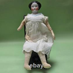 Antique German China head doll 15 inches tall and also included doll chair