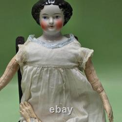 Antique German China head doll 15 inches tall and also included doll chair