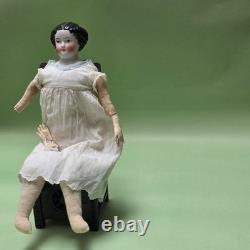 Antique German China head doll 15 inches tall and also included doll chair