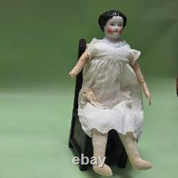 Antique German China head doll 15 inches tall and also included doll chair