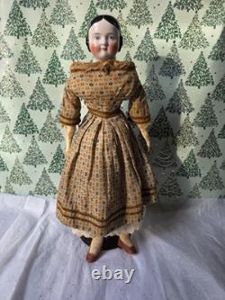 Antique German China head doll 22 inches tall