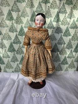 Antique German China head doll 22 inches tall
