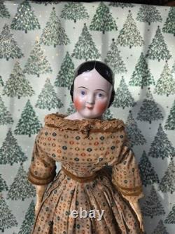 Antique German China head doll 22 inches tall