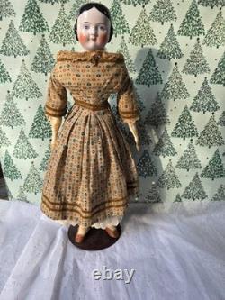 Antique German China head doll 22 inches tall