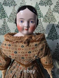 Antique German China head doll 22 inches tall