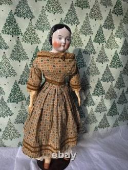 Antique German China head doll 22 inches tall