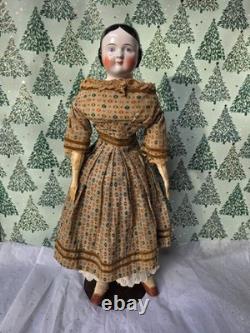 Antique German China head doll 22 inches tall