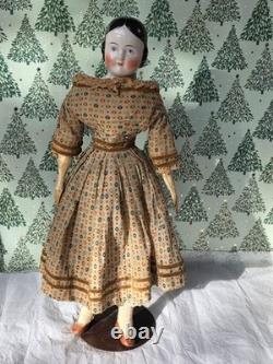 Antique German China head doll 22 inches tall